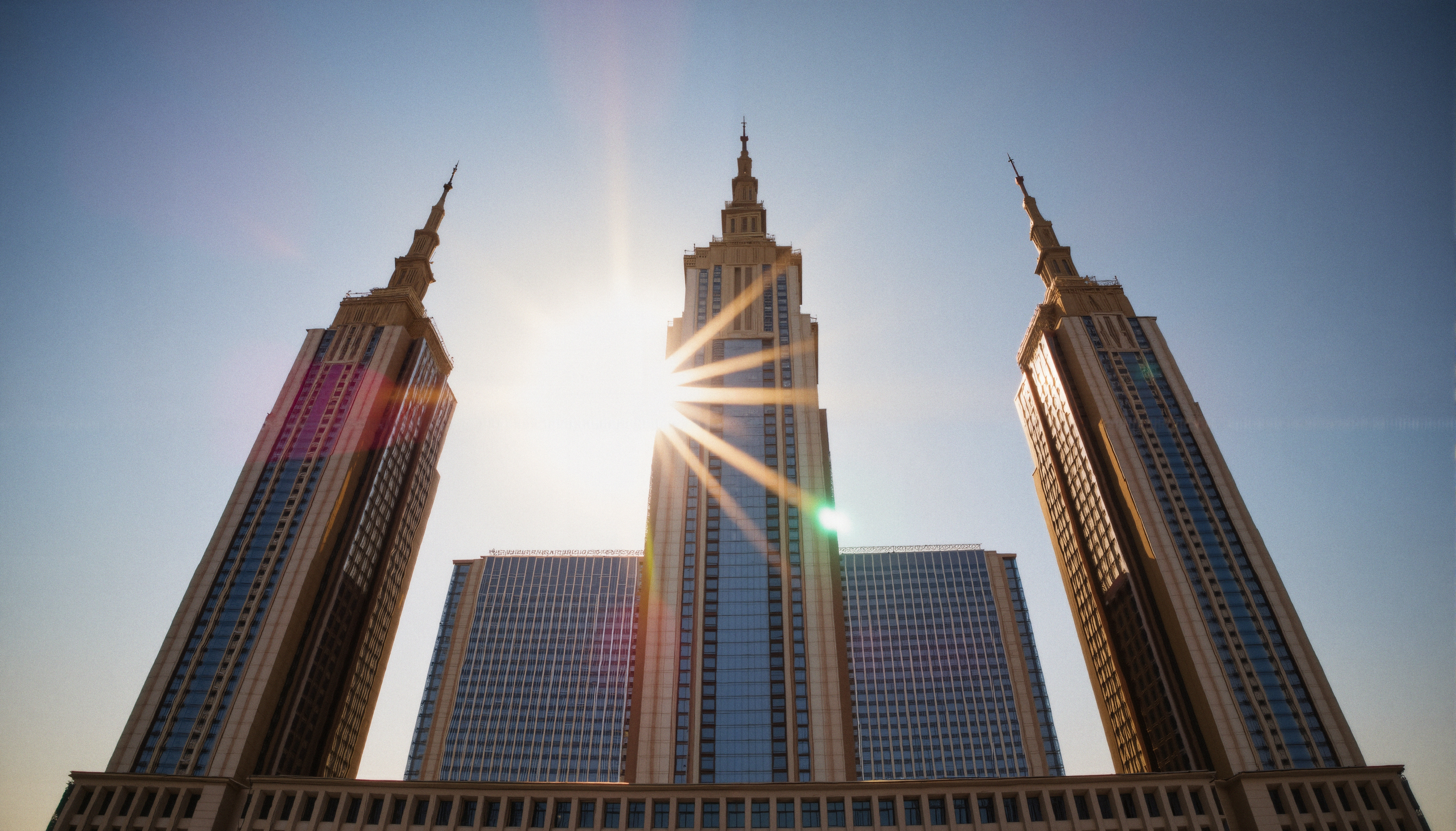 Empire State Building and Flanking Skyscrapers with Sunlight