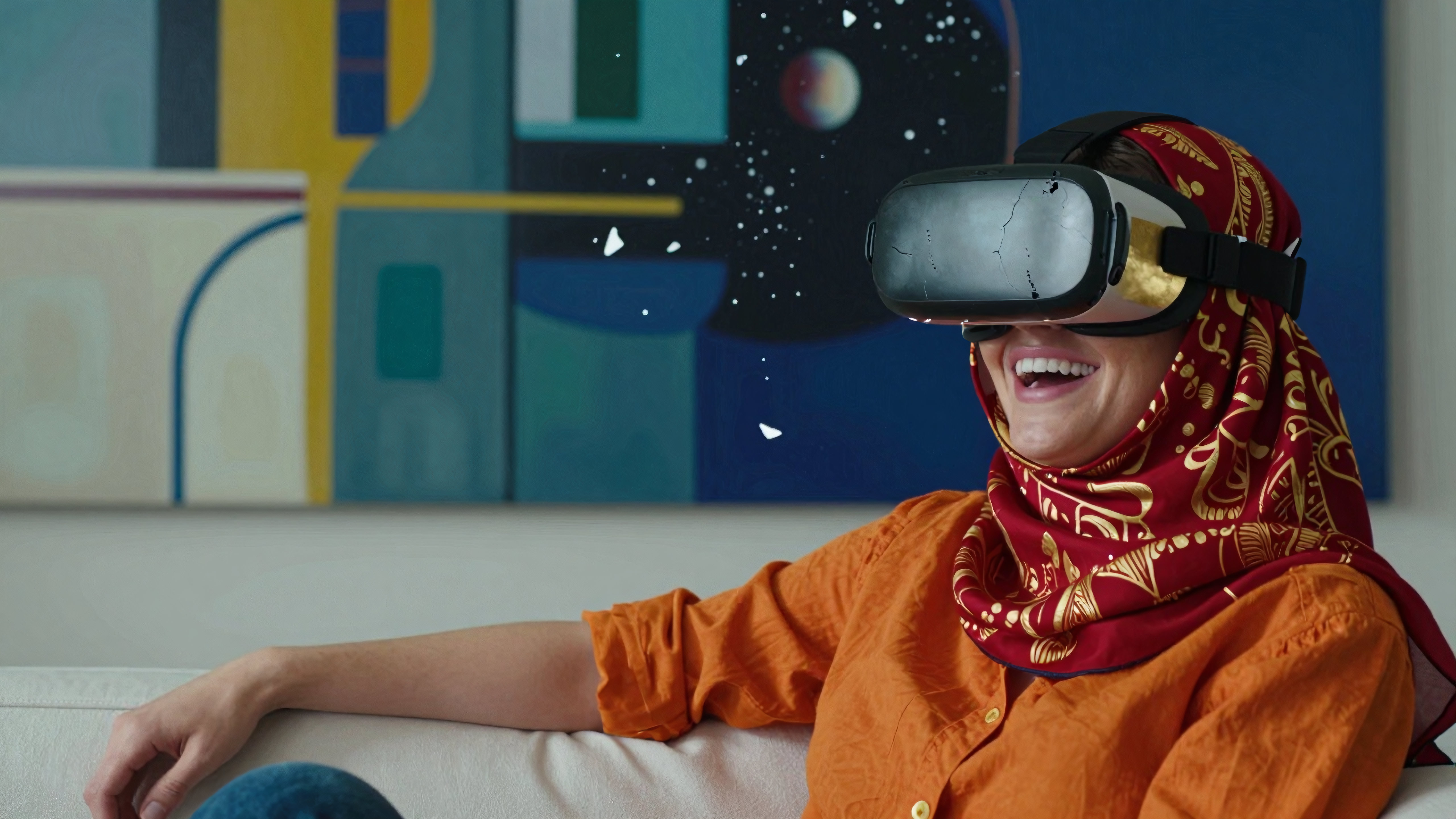 Woman laughing while using VR headset indoors